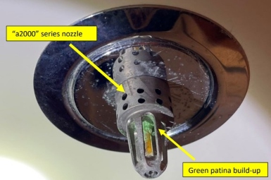 Warning over Green patina build up on water nozzles. Image credit: US Coast Guard