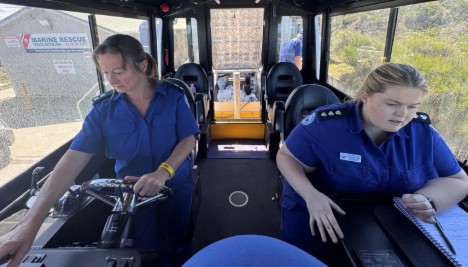 Lisa Mobbs and Taylor Marshall check the electronics on board rescue vessel Woolgoolga 30. Photo credit: Marine Rescue NSW