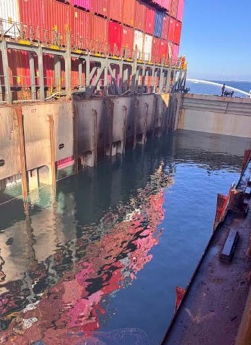 Firefighting water within the hold had implications for the vessel’s stability and structural integrity. Photo credit: USCG